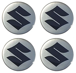 Naklejki na dekielki felgi kołpaki Suzuki srebrne 50 mm